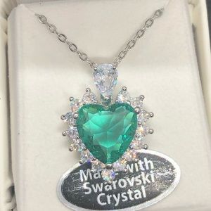 Beautiful Swarovski heart shaped crystals necklace. 16” S. Steel chain w/2” adj.
